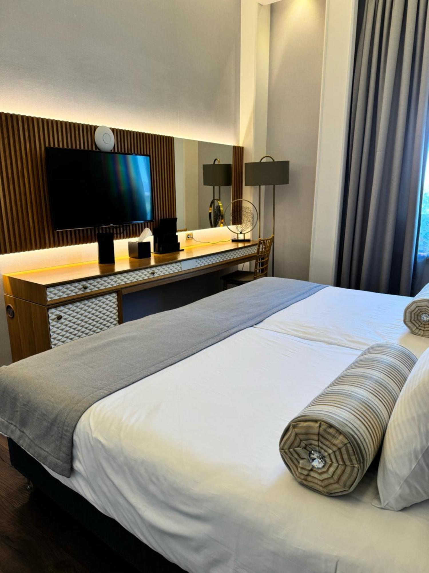 Promenade Hotel באקו מראה חיצוני תמונה A bedroom at the hotel
